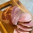 Load image into Gallery viewer, Forest pasture raised pork ham sweetheart boneless applewood smoked cured
